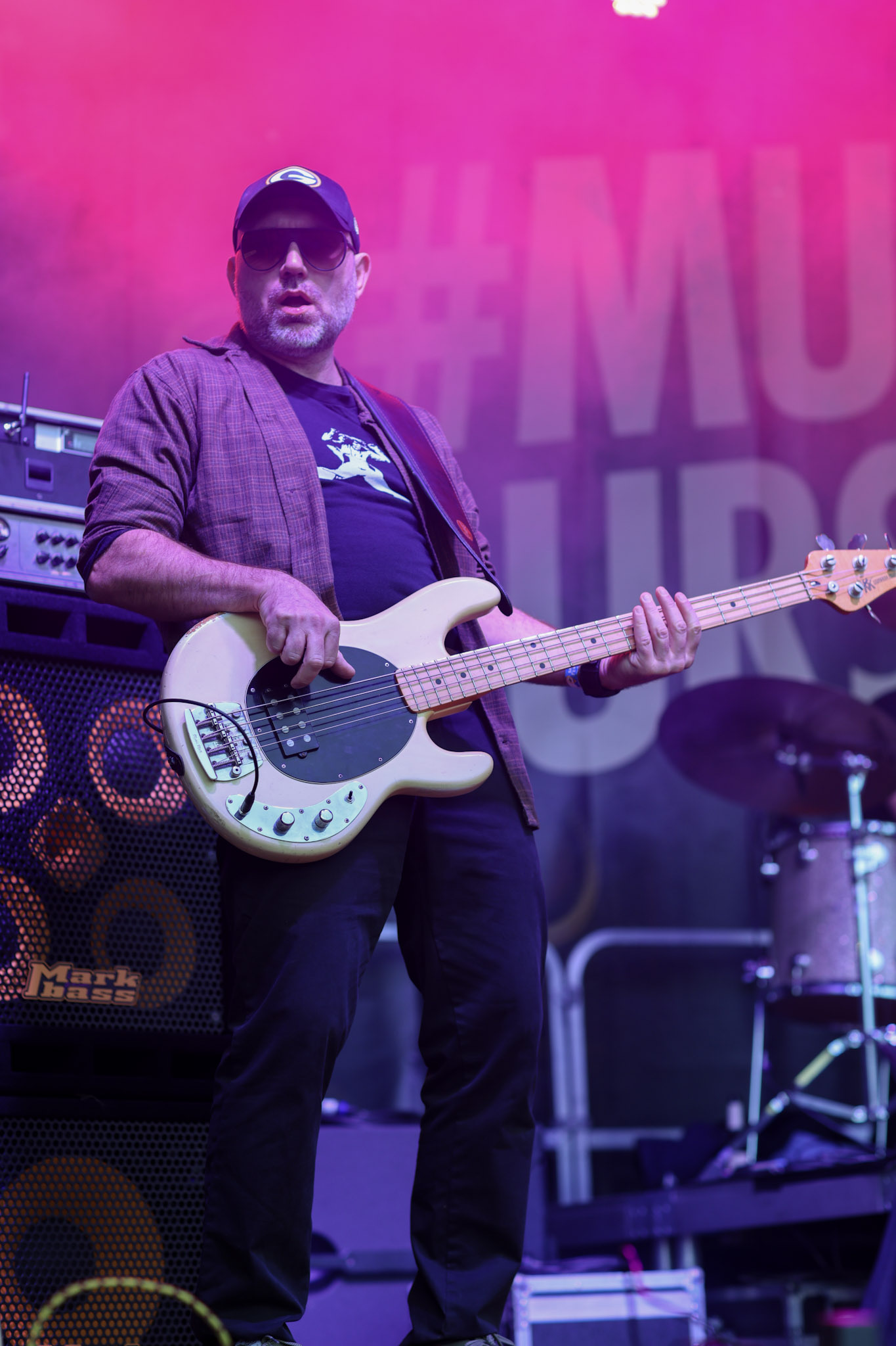 Alessandro Anselmo playing bass live on stage